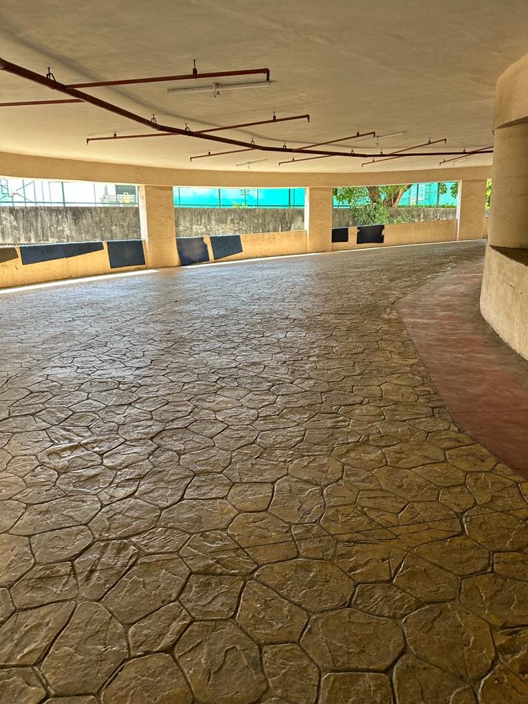 Coloured stamped concrete with slate texture