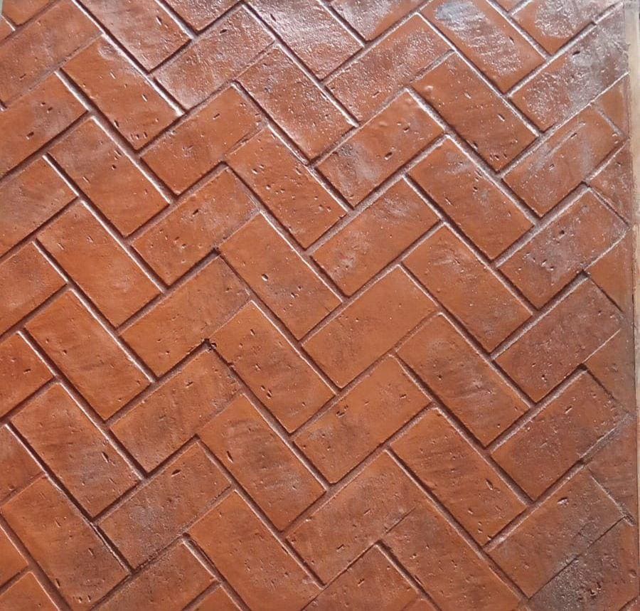 Stamped concrete entrance with decorative border