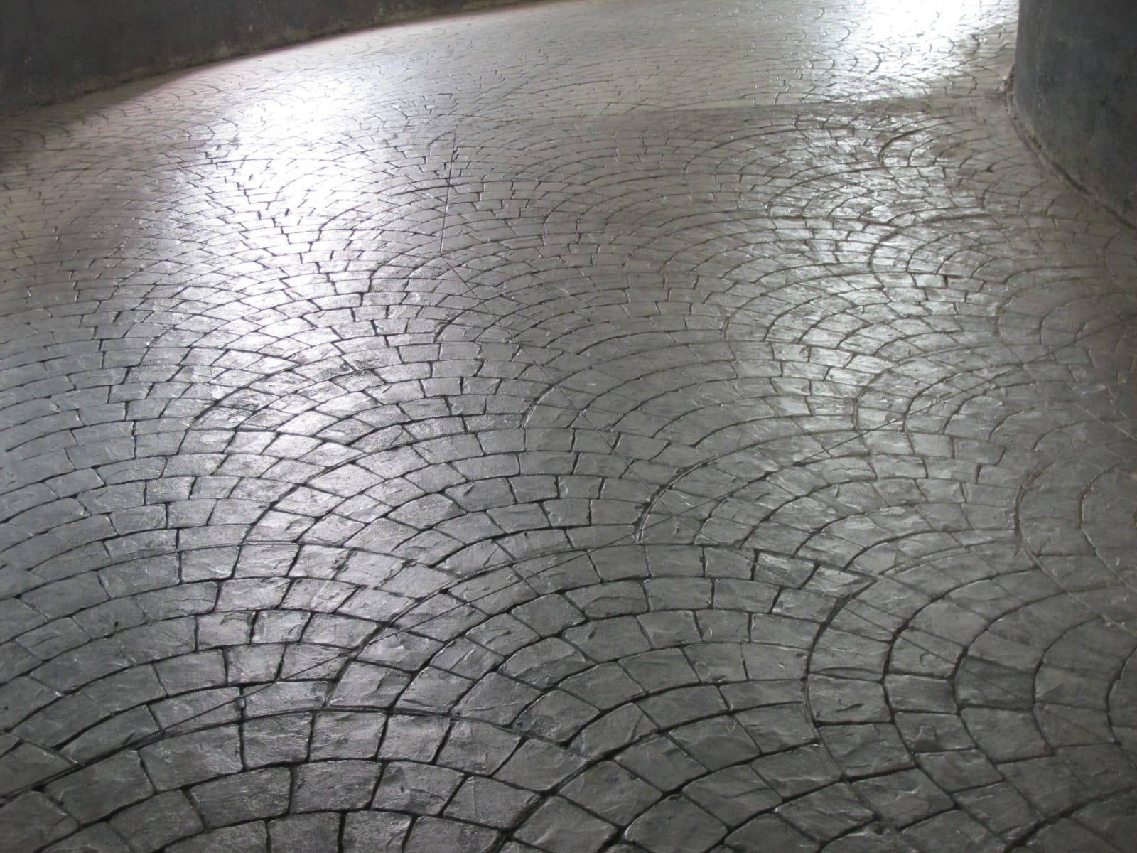 Stamped concrete entrance with colour accents