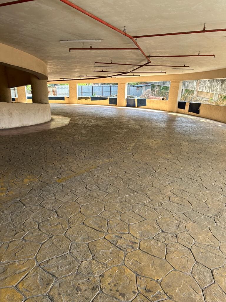 Stamped concrete ramp with anti-skid grooves