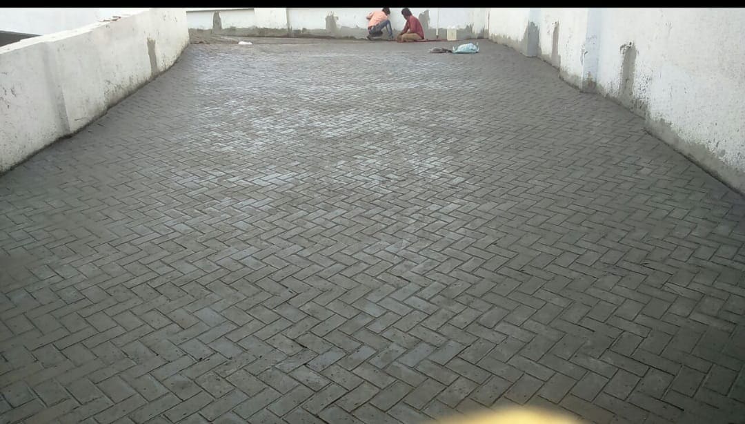 Stamped concrete with European cobble pattern