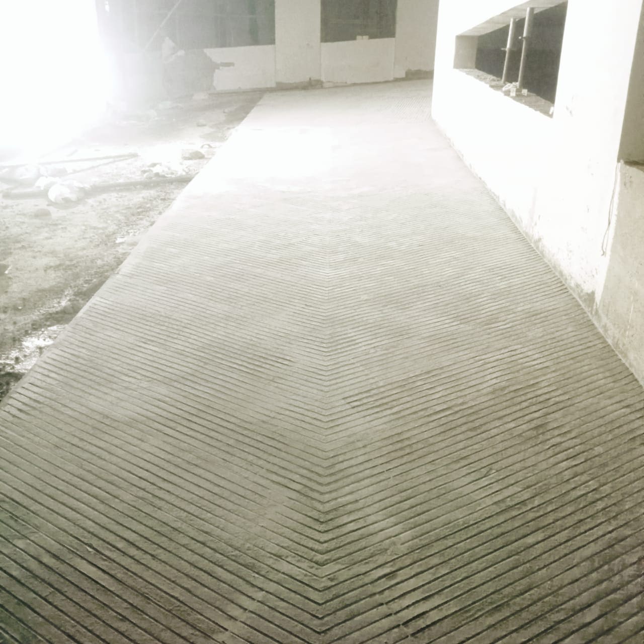 Stamped concrete with brick running bond