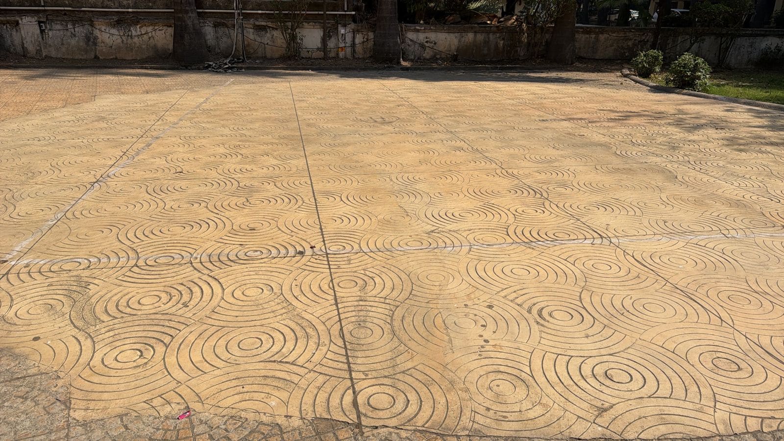 Stamped concrete with brick herringbone