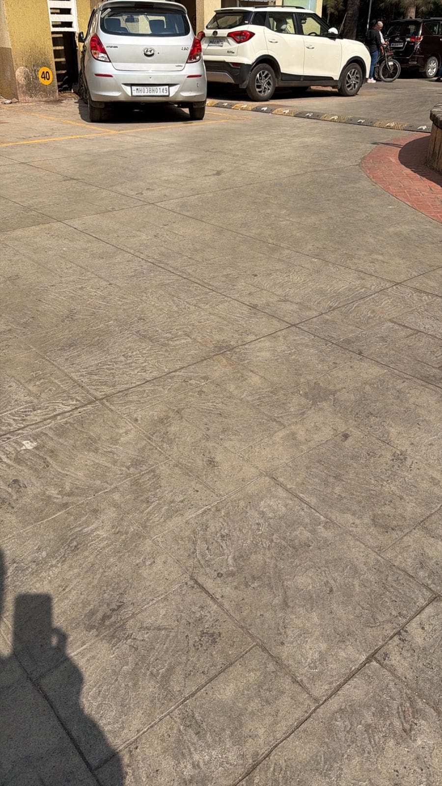 Stamped concrete with running bond brick
